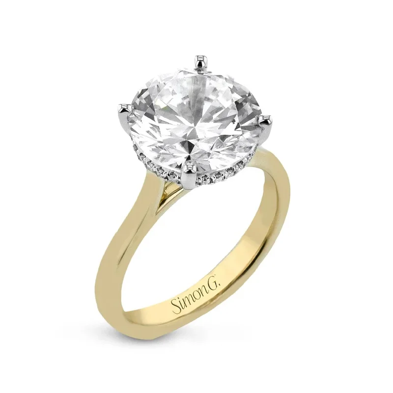 0.06 ctw Diamond Halo Engagement Ring