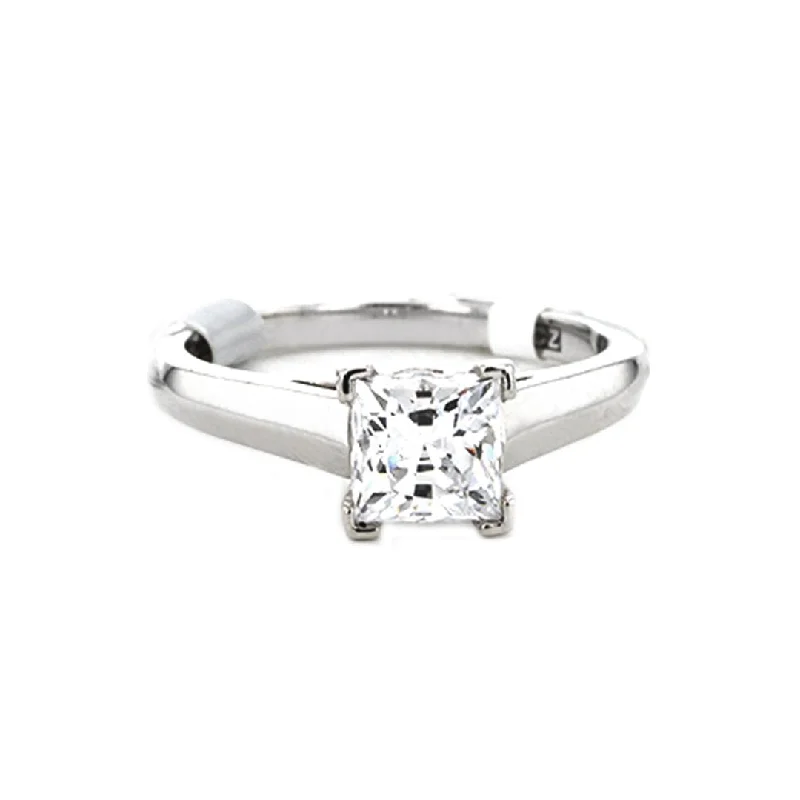 0.04 ctw Diamond Solitaire Engagement Ring